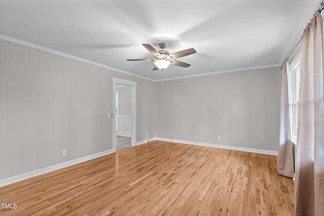 unfurnished room with ceiling fan, light hardwood / wood-style floors, and ornamental molding