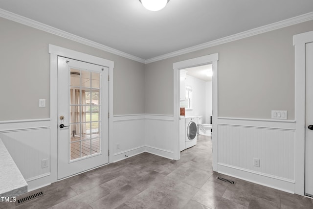 laundry room with independent washer and dryer and ornamental molding