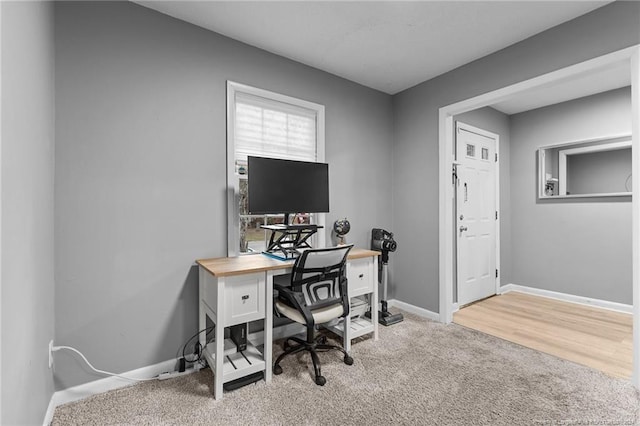 office area with light hardwood / wood-style flooring