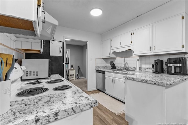 kitchen with white range, light hardwood / wood-style floors, stainless steel dishwasher, and white cabinetry