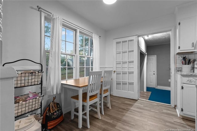 dining room featuring light hardwood / wood-style flooring