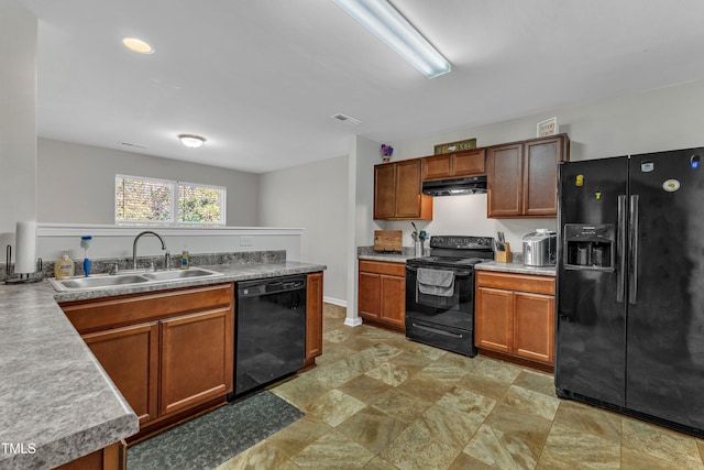 kitchen featuring black appliances and sink