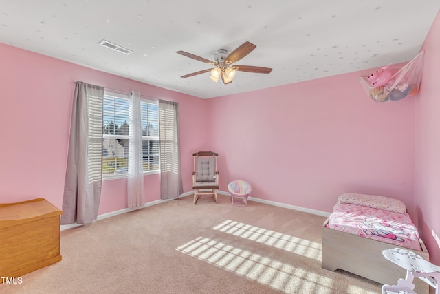 carpeted bedroom with ceiling fan