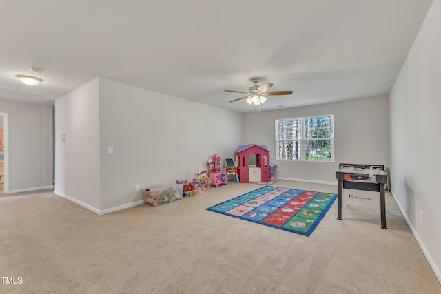 playroom featuring carpet flooring and ceiling fan