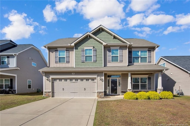 craftsman-style house with a front yard and a garage