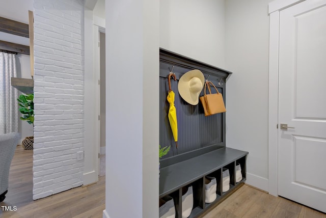 mudroom with light hardwood / wood-style flooring