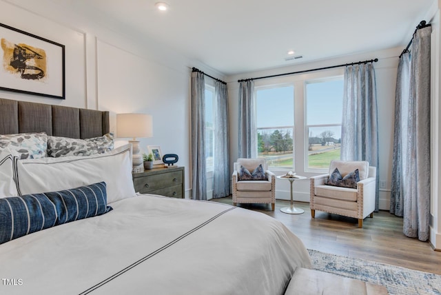 bedroom featuring light hardwood / wood-style floors