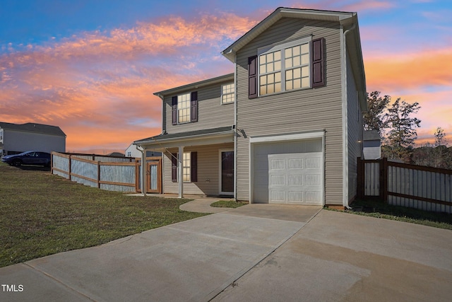 front facade featuring a porch, a garage, and a lawn