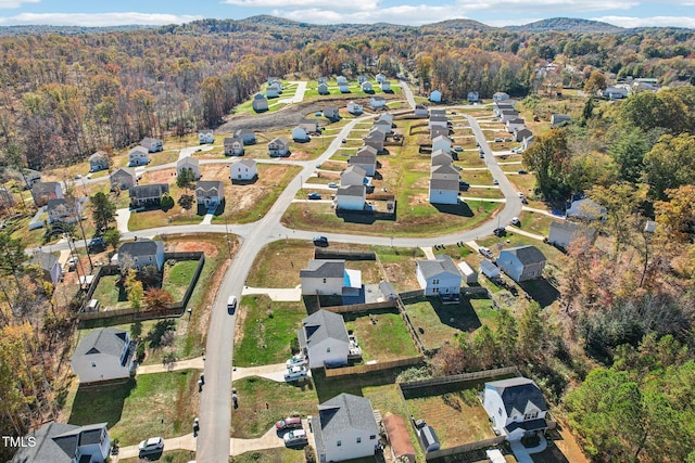 drone / aerial view featuring a mountain view