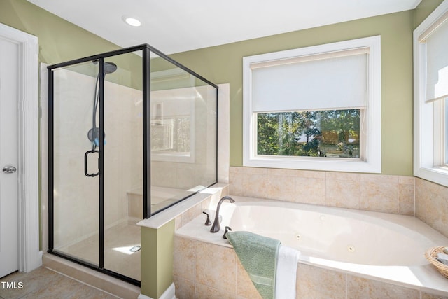 bathroom with independent shower and bath