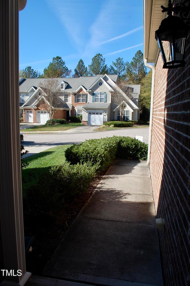 view of yard featuring a residential view