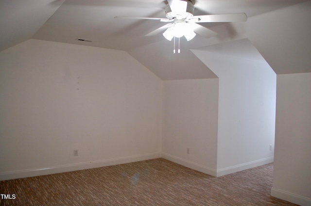 bonus room with visible vents, ceiling fan, baseboards, and lofted ceiling