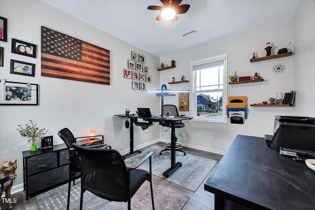 office space with ceiling fan and wood-type flooring