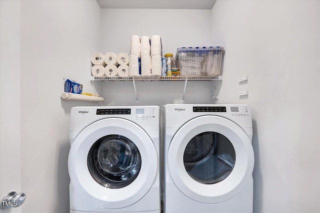 washroom with separate washer and dryer