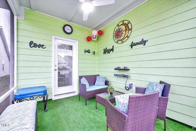 view of patio featuring ceiling fan