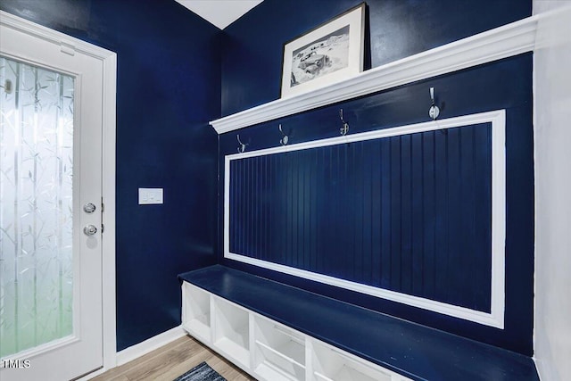 mudroom with wood-type flooring