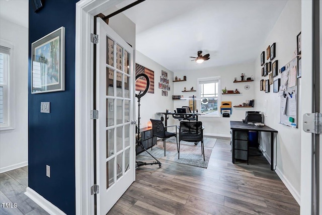 office space featuring ceiling fan and dark wood-type flooring