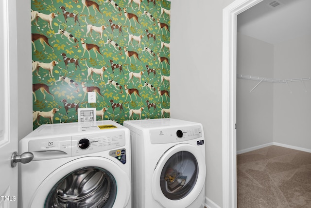 laundry area featuring carpet flooring and separate washer and dryer