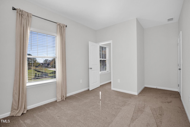 view of carpeted spare room