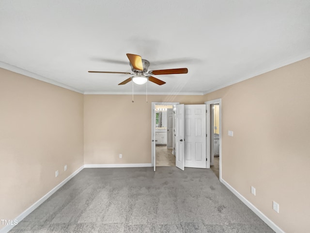 unfurnished bedroom with carpet flooring, ceiling fan, and crown molding