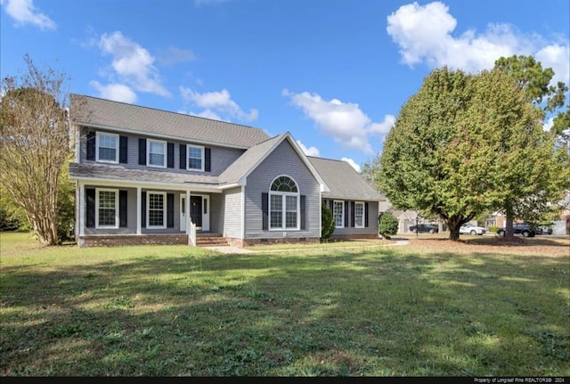 view of front of house featuring a porch and a front lawn