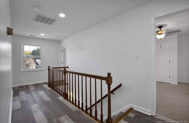 hall featuring dark wood-type flooring