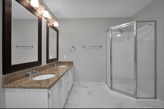 bathroom with vanity and walk in shower