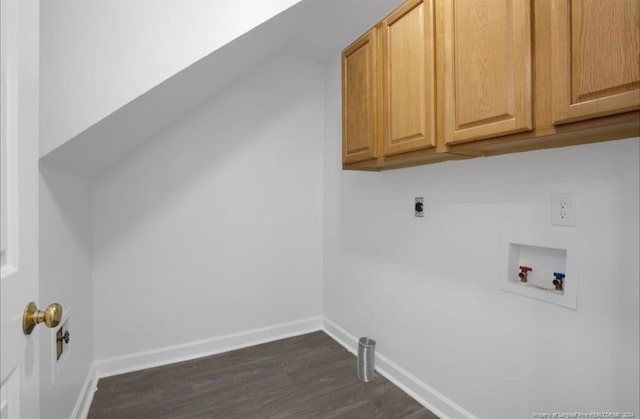 laundry area with hookup for an electric dryer, cabinets, dark wood-type flooring, and hookup for a washing machine