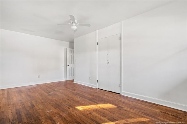 unfurnished bedroom featuring wood-type flooring and ceiling fan