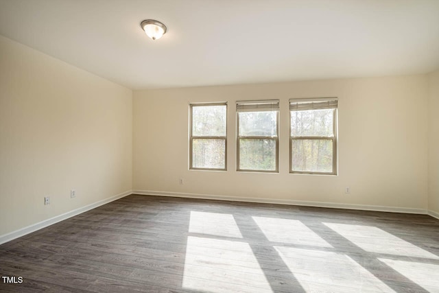 spare room with light wood-type flooring