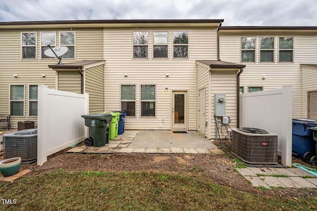 back of house featuring central AC and a patio area