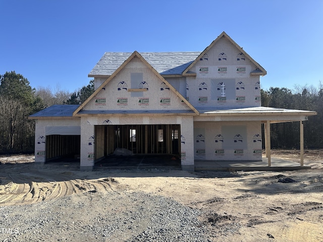 property in mid-construction featuring a garage