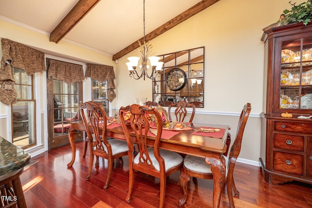 dining room featuring a chandelier, lofted ceiling with beams, hardwood / wood-style flooring, and ornamental molding