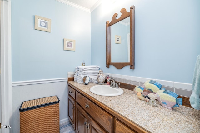 bathroom featuring hardwood / wood-style flooring, vanity, and ornamental molding