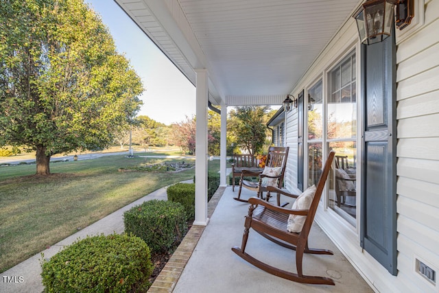 view of patio featuring a porch