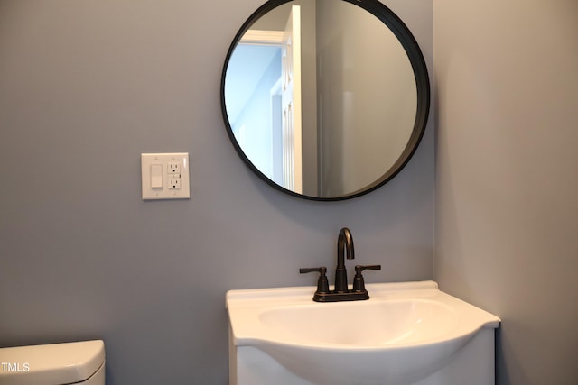 bathroom featuring sink and toilet