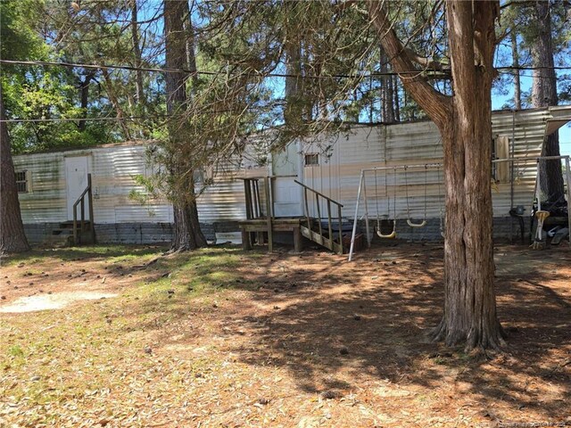 view of yard with entry steps