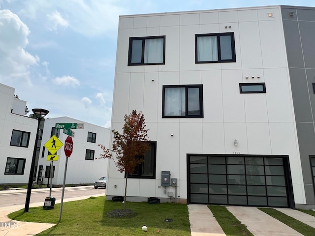 view of property featuring a garage