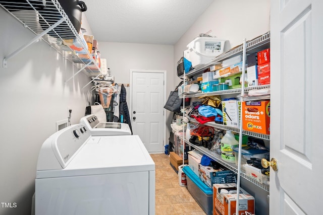 104 Full Moon Ct, Garner, NC 27529 - washroom with washer and clothes dryer and a textured ceiling