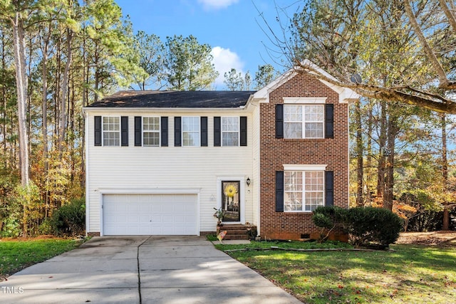 104 Full Moon Ct, Garner, NC 27529 - view of front of home featuring an attached garage, driveway, a front lawn, brick siding, and crawl space