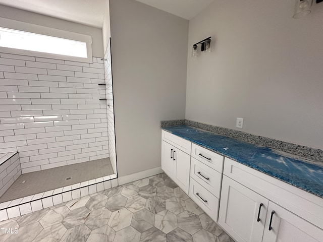 bathroom featuring tiled shower