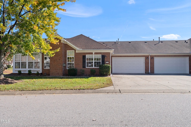 single story home with a garage