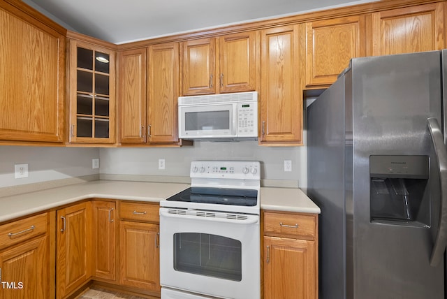 kitchen featuring white appliances