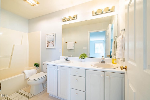 full bathroom featuring vanity, toilet, and shower / washtub combination