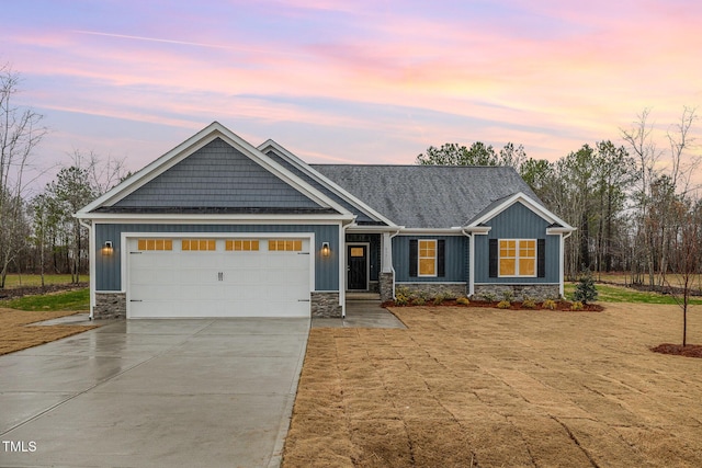 craftsman inspired home featuring a garage