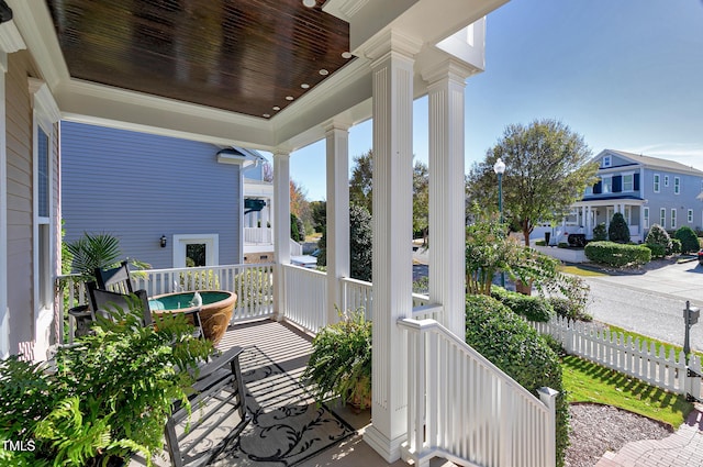 balcony featuring a porch