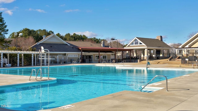 view of pool featuring a patio