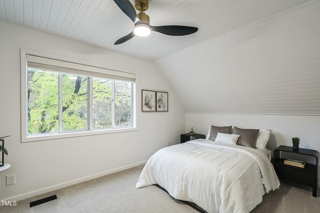 bedroom featuring carpet flooring, ceiling fan, and lofted ceiling