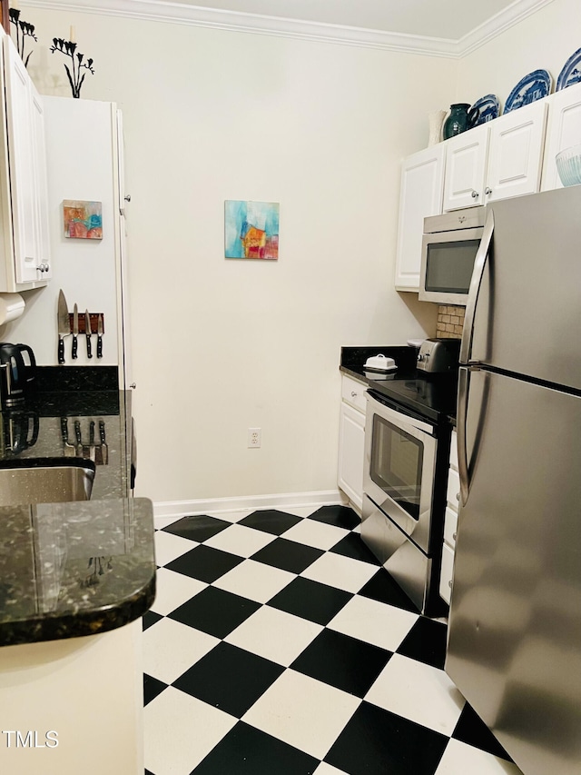 kitchen featuring stainless steel appliances, white cabinetry, ornamental molding, and sink