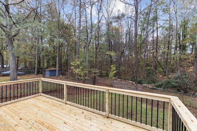 deck featuring a shed